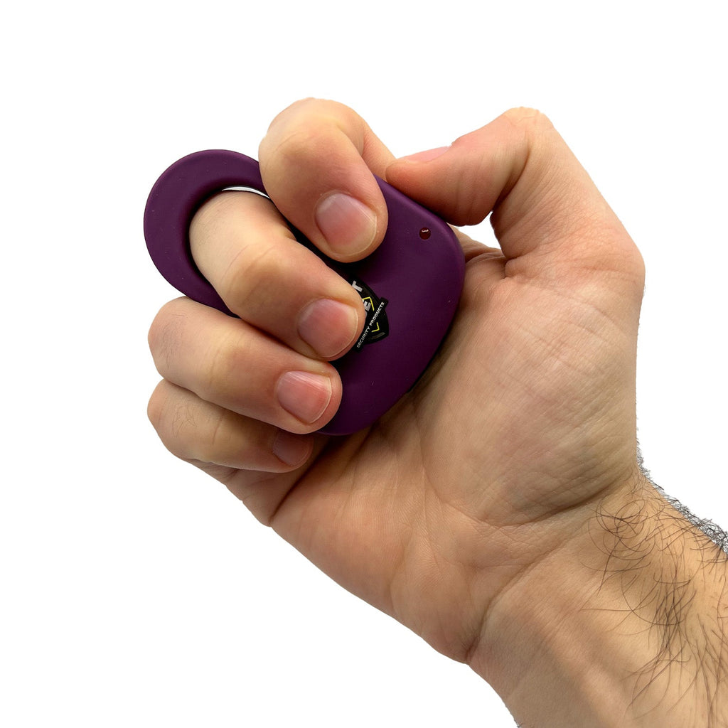 Streetwise finger ring stun gun electric knuckle dark purple compact personal safety product in hand